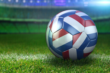 Fototapeta na wymiar Netherlands Soccer Ball on Stadium Green Grasses at Night