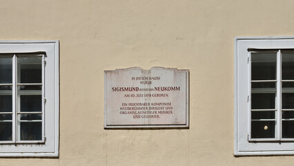 Fototapeta na wymiar Memorial plaque at the house in Salzburg where Sigismund Ritter von Neukomn was born, Austria