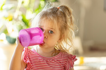 Baby two years old, drinking milk