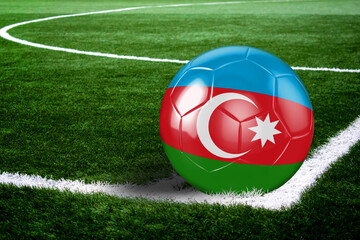 Fototapeta na wymiar Azerbaijan Soccer Ball on Field at Night