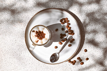 Traditional Italian dessert Tiramisu in glass cups on gray table. National cuisine recipe. Summer refresh coffee cream sweet mousse dish.