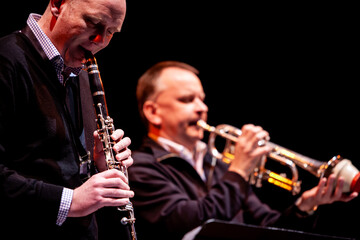 Big Band: clarinet and trumpet duet. From a series of images of musicians in a swing Jazz band. - obrazy, fototapety, plakaty