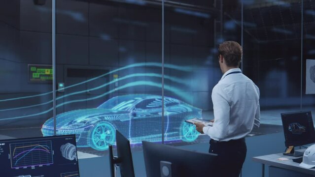 Engineering Research Agency Perform Aerodynamic Testing with a Modern Eco-Friendly Electric Sports Car Render in a Wind Tunnel. Chief Development Officer Works on a Tablet and Changes Testing Options.