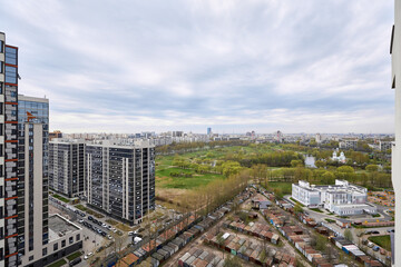 Fototapeta premium View from the window to a beautiful park and city