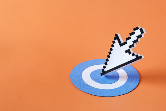 Pixel digital arrow mouse pointer modern technology as the arrow hit the target. Minimal creative concept with copy space.