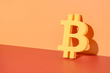 Bitcoin symbol on a bright background as a concept of money crypto market and blockchain internet technology.