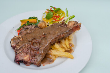 juicy bbq rib steak with garlic mashed potatoes and brocolli