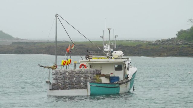 Lobster fishing boat in marina with seagull flying slow motion HD 30p