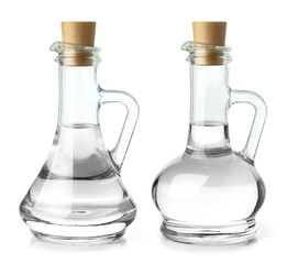 Set of glass jars with water or some clear liquid, isolated on white background
