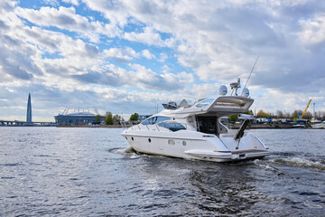 Luxury private motor yacht sailing in the bay