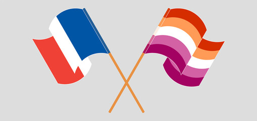 Crossed and waving flags of France and Lesbian Pride