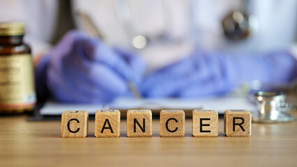 Cancer disease and oncology doctor writes cancer diagnosis and treatment