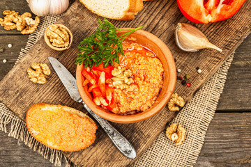 Traditional Middle Eastern dip Muhammara. Roasted red bell pepper with walnuts and spices