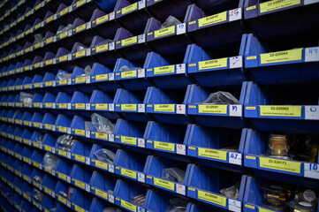 Small blue electronic component storage compartment. systematically stored