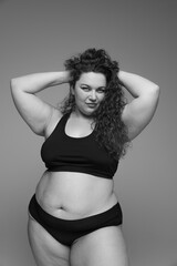 Naklejka premium Portrait of beautiful woman posing in underwear. Black and white photography. Wellness