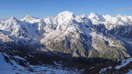 snow-capped mountain peaks at dawn