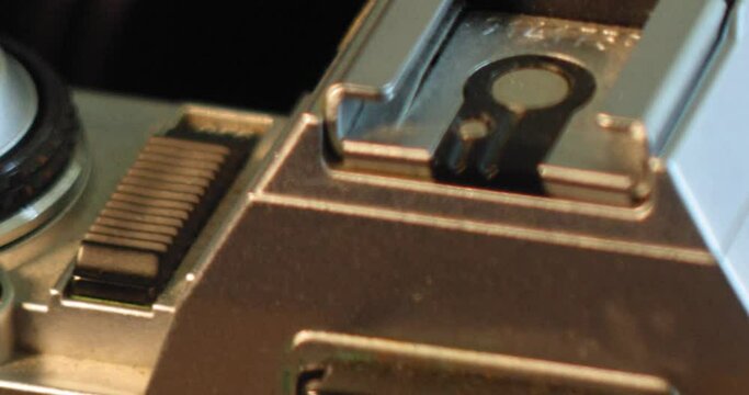 Macro Dolly of Vintage and Antique 35mm Cameras and Equipment slides past viewfinder