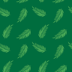 Fototapeta na wymiar This is a seamless pattern with leaves on a green background