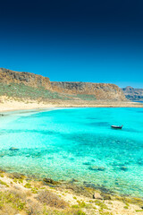 Fototapeta na wymiar Amazing crystal clear water on the shoreline of Gramvousa Island, Crete, Greece