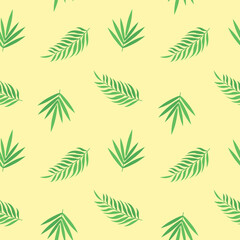 Fototapeta premium This is a seamless pattern with tropical leaves on a yellow background