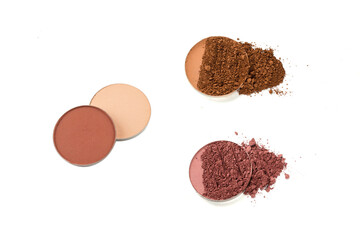 Eyeshadow crushed palette, colorful eye shadow powder isolated on a white background.