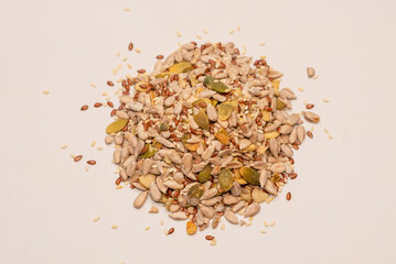 Mix of seeds for a salad. A pile of mixed seeds.