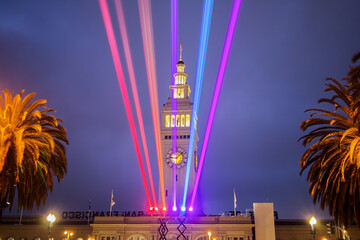 San Francisco Pride Weekend WELCOME Laser Lights in front of Landmark at Night