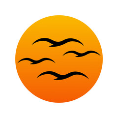 Silhouette of waves of birds in the sunset