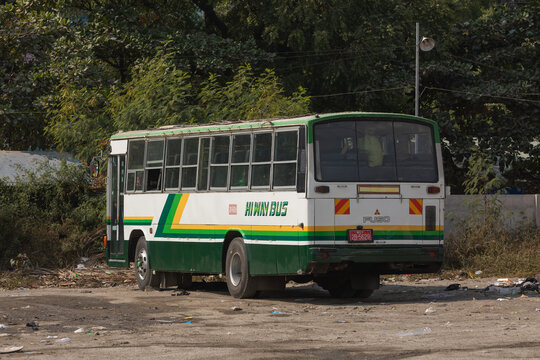 Mandalay, Burma - Dec 3121, 2019: An old bus parked at the side of the Chan Mya Shwe Pyi bus station compound, Highway Station in Mandalay