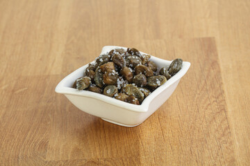 Salted marinated capers snack appetiser