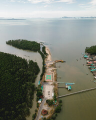 Aerial view of a football field in the mangrove jungle