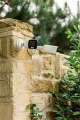 Futuristic security cameras scanning the street in 4K.