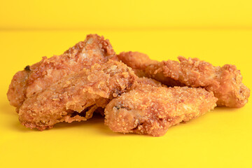 Chicken wings, chicken wings on yellow background, bright background
