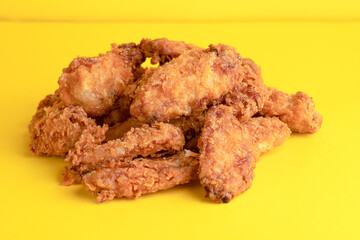 Chicken wings, chicken wings on yellow background, bright background