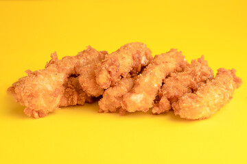 Chicken strips, chicken strips on yellow background, bright background