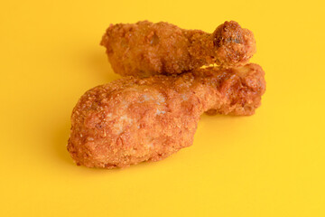 Chicken legs, chicken legs on a yellow background, bright background