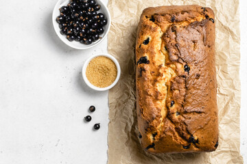 Black currant loaf cake. Top view, copy space.