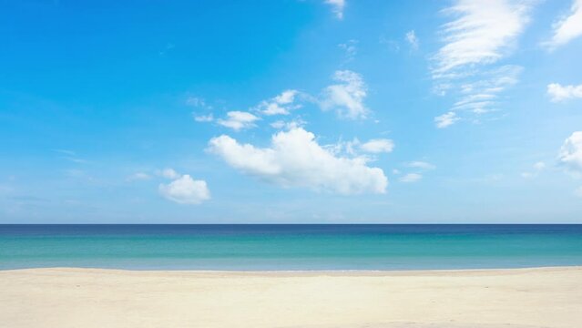 Landscape video Tropical beach sea blue sky background Low angle view camera on tripod stand. Beach sea beautiful in nature At Phuket Thailand Nature and travel concept.