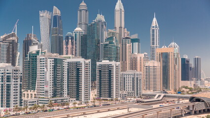 Fototapeta premium Dubai marina tallest block of skyscrapers timelapse.