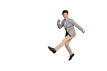 Fototapeta na wymiar Young Asian businessman jumping in air and showing credit card isolated on white background, Full length composition