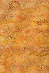 Background with textured hard brush relief strokes, prints and spots of orange, gold and yellow paint