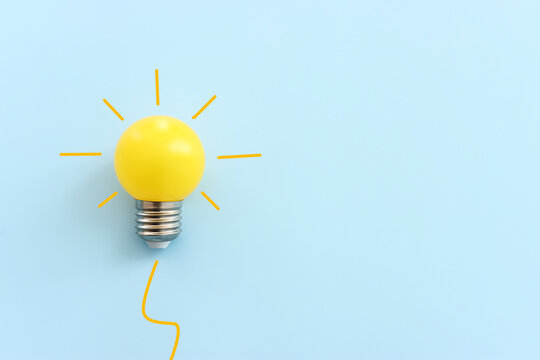 Education concept image. Creative idea and innovation. light bulb metaphor over blue background