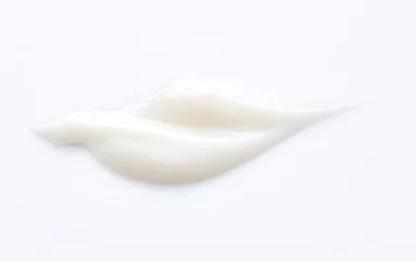 Fotobehang White Cosmetic Cream Isolated on White Background. © RooftopStudioBangkok