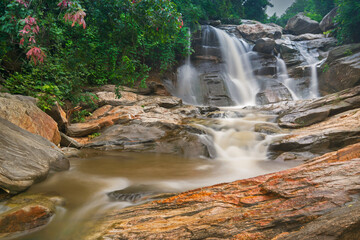Beautiful Turga waterfall having full streams of water flowing downhill amongst stones , duriing monsoon due to rain at Ayodhya pahar (hill) - at Purulia, West Bengal, India.