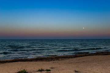 Fototapeta na wymiar the evening sea landscape at the stormy weather, Azov sea, Ukraine