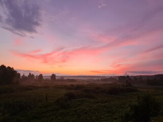 fantastic sunsets over the hills, meadows and forest