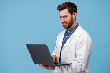 Smiling doctor in white uniform conducts online consultations with the patient 