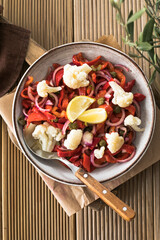 Warm salad or vegetable stew made from red beans and roasted red bell peppers. Vegan food. Thanksgiving Day