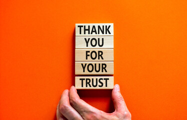 Thank you for trust symbol. Concept words Thank you for your trust on wooden blocks on a beautiful...