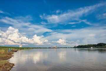 Beautiful time. View of Mekong River Vientiane, Laos. fisher men, boat on mekong, background city